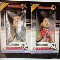 Two NHLPA Headliners XL bobbleheads Eric Lindros and Chris Chelios in original box packaging, numbered 1 of 15,000.