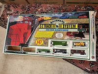Full view of the train set box showing the Bachmann E-Z Track System Silver Lightning branding and contents visible through plastic window.