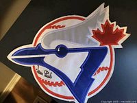 Front view photo of the embroidered Toronto Blue Jays throwback logo patch with Dave Stieb autograph.