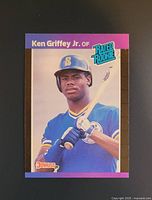 Front of Ken Griffey Jr. 1989 Donruss Rookie card showing player image, team uniform, and Rated Rookie logo.