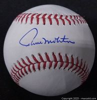Autographed baseball showing clear blue ink Paul Molitor signature on the front.