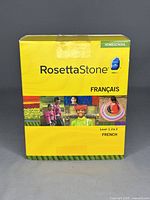 Front view of yellow box containing Rosetta Stone French Levels 1, 2, and 3 software, labeled 'FRANÇAIS' and 'Homeschool'.