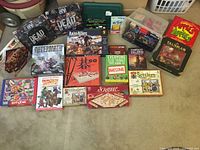 Full overview of game boxes and card games including Axis & Allies, Dead of Winter, Scrabble, Settlers of Catan, Talisman