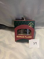 Photo of a sealed Jameson Whiskey flask box showing the flask inside