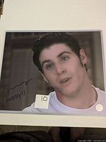 Signed 8x10 photo of Jon Abrahams with inscription "Bobby!!" in black ink