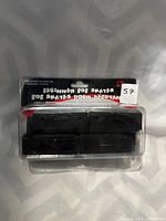 Front view of the unopened package of kids beginner bob skates in black, showing brand and age recommendations.