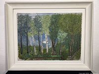 Framed oil painting of forest scene with birch and pine trees by a lake, in white wooden frame