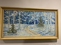 Full view of the framed vintage winter landscape painting signed Carson. Shows snow-covered pine and birch trees and a winding path under a blue sky.