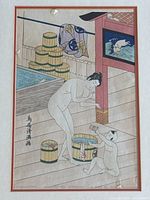 Detailed close up of the woodblock print revealing tears and the fine detail of the design with woman and child in bathing scene.