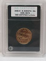 Front of the certified coin holder showing label with coin details, graded GEM MS70 by INB Certification.