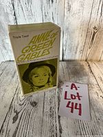 Box set of three Anne of Green Gables paperback books showing front of the original box with yellow title text and child's portrait.