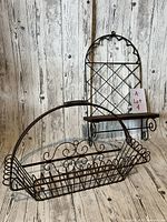 Both wire basket and wall-mounted shelf together showing overall size and design