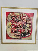 Full view of framed acrylic painting with abstract fruit motif