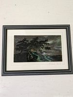 Full view of framed art glass panel in black wood frame with white mat, showing overall condition and signature placement