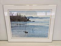 Full front view of framed print showing scene, matting, frame