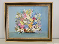 Front view of framed oil painting floral still life