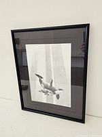 Framed full view of the pencil drawing showing the three orcas and framing details.