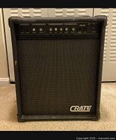 Full front view of Crate KX-50 amplifier showing the textured grille and Crate logo.