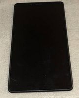 Lenovo Tab M8 HD tablet powered off, front view showing intact display and minimal visible wear.