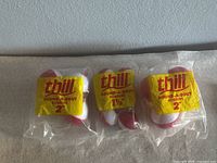 Three packs of Thill Round-A-Bout fishing bobbers in factory packaging, showing two packs labeled 2 inches and one pack labeled 1 1/2 inches.