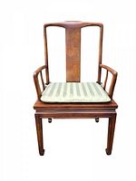 Front view of vintage Henredon Ming-style mahogany armchair with removable striped cushion on caned seat.