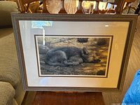 Full view of framed artwork showing mat and frame style