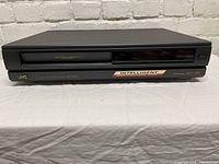 Front view of JVC HR-D970U VHS Player with visible branding and 'Intelligent Systems' sticker.