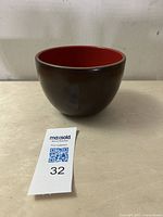 Front side view of Heath Ceramics bowl showing matte brown exterior.