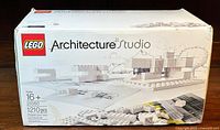 Front of box showing LEGO logo, ‘Architecture Studio’, set number 21050, age 16+, and ‘1210 pcs’
