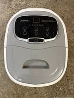 Top view of the closed costway foot spa showing digital control panel with buttons and display.