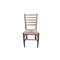 Front view of the Danish style chair showing ladder back and woven seat