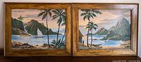 Both framed paint by number tropical island scenes side by side on wall.
