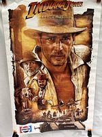 Full view of the Indiana Jones and the Last Crusade movie poster showing detailed artwork of the characters and scenes along with the Pepsi branding.