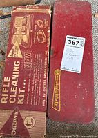 Photo of Outers Rifle Cleaning Kit metal box with original cardboard packaging showing vintage condition