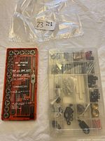 40-piece tap and die set in red plastic case and plastic bin with screws and washers