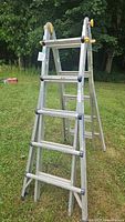 Ladder in A-frame stepladder configuration, open view