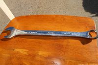Chrome alloy combination wrench, 1-1/8 inch size, front and back view showing markings and condition.