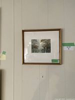 Full frontal view of framed watercolor on wall