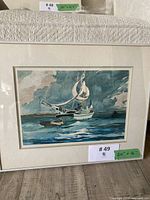 Full view of framed watercolor depicting sailboat on water
