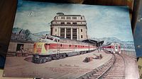 Framed signed picture depicting 'The Phoebe Snow' passenger train at Lackawanna railroad station with detailed vintage illustration of train, platforms and building.