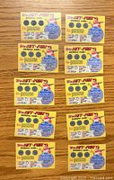 Front view of 10 yellow 1981 Topps Hit To Win baseball scratch game cards showing front game and scratch circle areas.