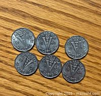 Six 1945 Canada 5 cent coins showing the 'V' for Victory design on one side with maple leaf accents.