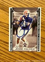 Front of the signed Jesse Palmer football card showing him in New York Giants uniform, signed in blue marker.