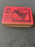 Original red and brown cardboard box labeled No. 47 Clamplite with product illustration and usage details.