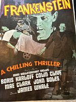 Close-up of the vintage Frankenstein poster showing artwork, title, and cast details.