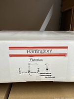 Box label showing Harrington brand and Victorian model kitchen faucet with 4-hole and spray configuration.