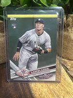 Front image of 2017 Aaron Judge Yankees rookie card #147 in protective case. Card displays player in fielding position, team logo, and rookie card badge.