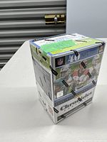 Sealed 2020 Panini Chronicles Football blaster box with NFL players graphics and branded tape.