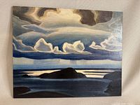 Full view of the painting showing the silhouetted landmass and dramatic cloudy sky in muted blues, blacks, whites, and grays.