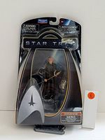 Photo shows the Star Trek Nero collectible figurine in sealed blister pack with Playmates Toys branding.